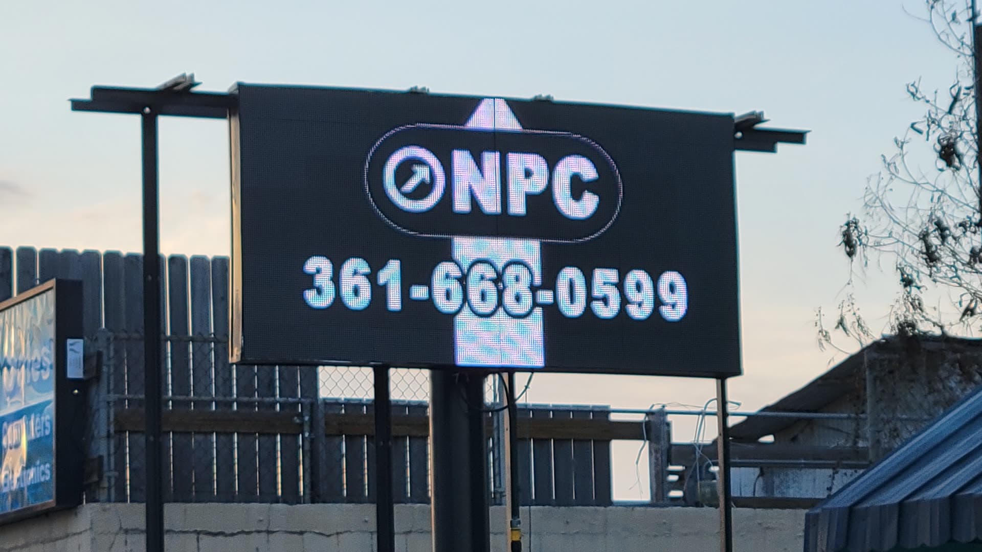 The NPC LED sign on Main displaying the NPC logo and (361) 668-0599